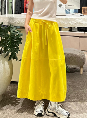 洋气优雅黄色系带A字伞裙2025年夏季新款宽松显瘦遮肉休闲风长裙