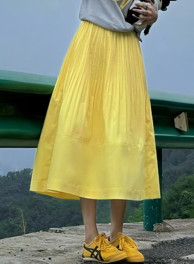 黄色褶皱休闲风薄款A字裙女2025年春夏新款韩版甜美优雅风半身裙