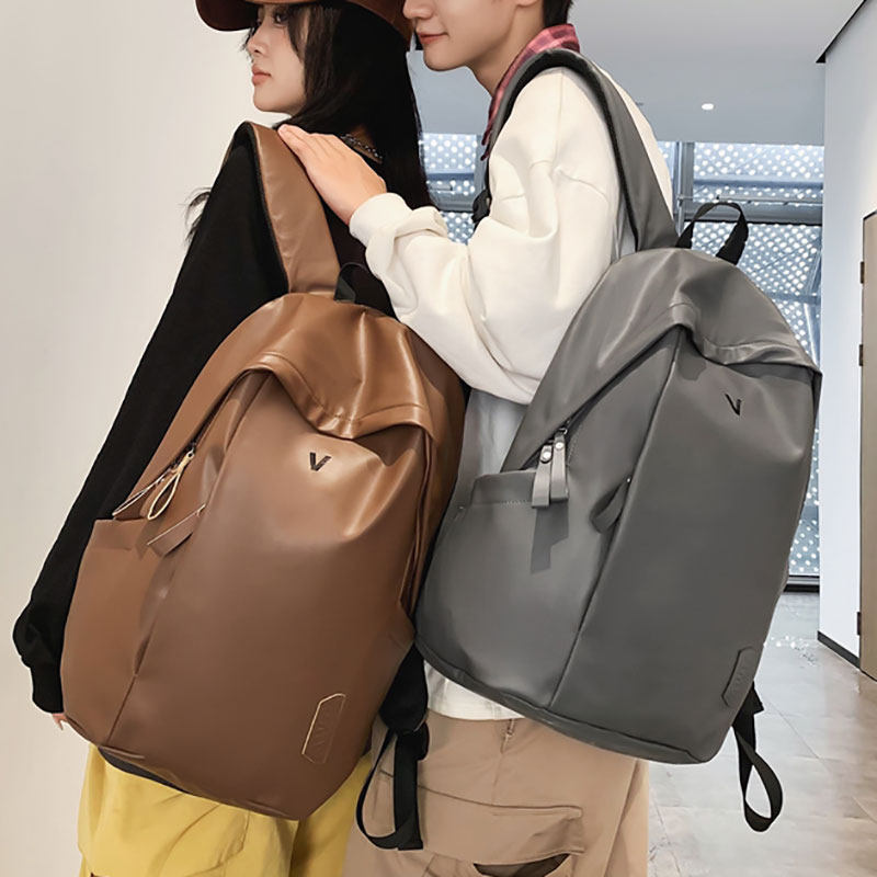 PU皮双肩包男通勤高级感大容量大学生旅行出差电脑背包防水书包女