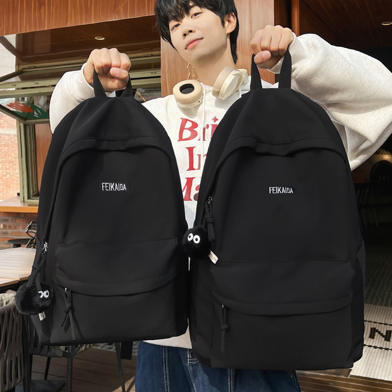 潮酷黑色系双肩包男初中生书包女高中大学生轻便背包女简约旅行包