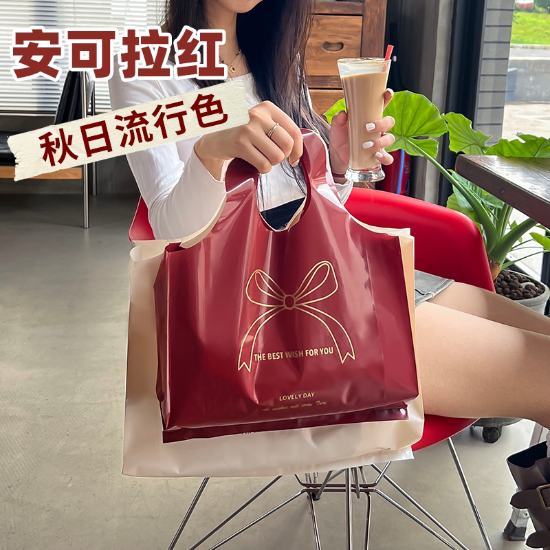 时尚简约服装店手提袋打包袋包装袋女装衣服购物袋塑料袋小号口袋