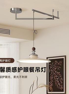 The chandeliers of the Middle Winding Arms Restaurant are re