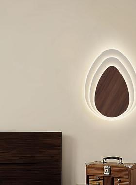 A modern, simple stairway walllight bedhead lamp for a Frenc