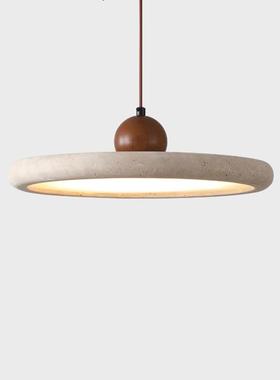 The chandelier in Janes Dining Room is a walnut-lighted bar