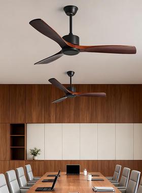 Theres a lightless fan in the living room of a black fan han