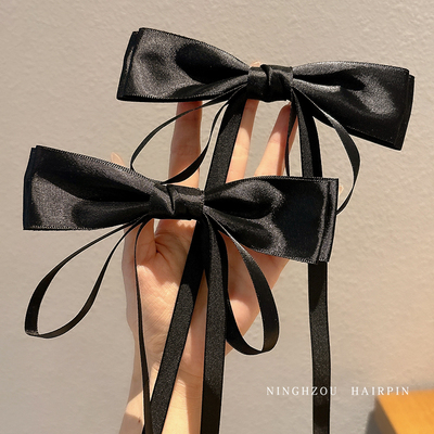 黑色蝴蝶结飘带一字发夹女后脑勺