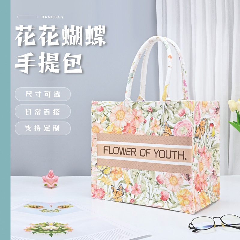 帆布包大容量花花蝴蝶帆布袋工厂多口袋女士伴手礼手提托特包
