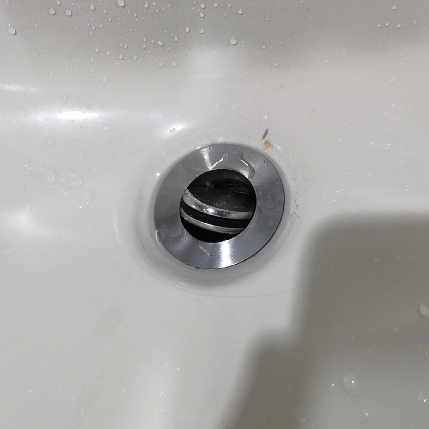 防臭塞洗脸盆翻板304不锈钢下水管按压式去水器排水弹跳芯水盆图片