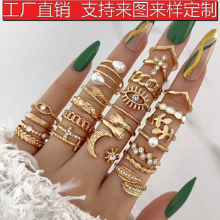 跨境热销滴油镶钻眼睛十字架树叶戒指 多关节23件套珍珠日月戒指