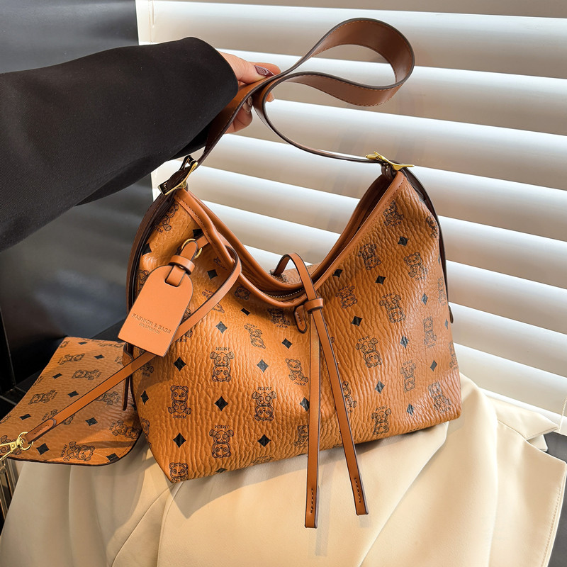 大容量复古托特包包女2025新款时尚休闲购物袋轻奢通勤腋下斜挎包