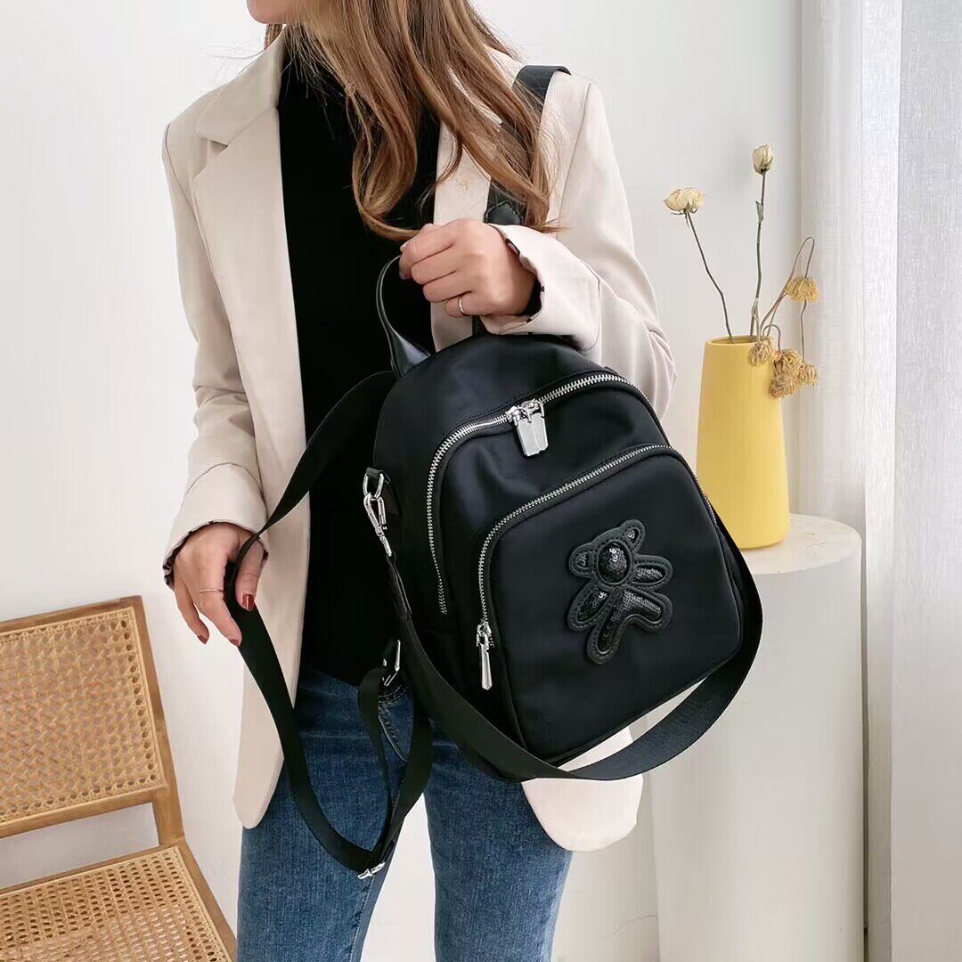 多功能双肩包女2026新款防水牛津布旅行背包时尚休闲单肩手提通勤