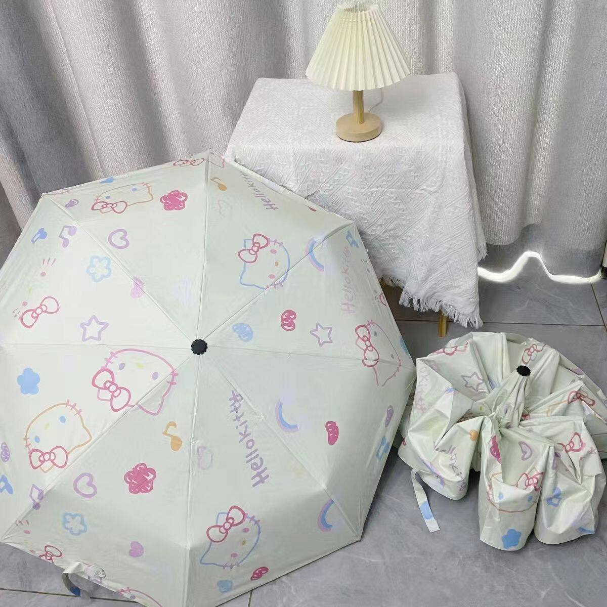 新款卡通印花色KT猫雨伞黑胶防晒防紫外线全自动学生安全节节收伞