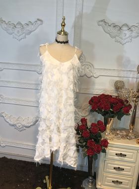 度假海边约会名媛大牌绑带羽毛不规则裙摆白色吊带裙背心裙