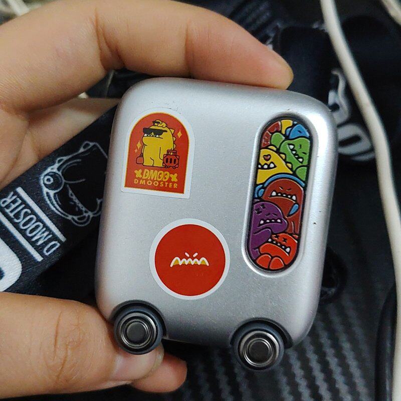 维修象鼻子D03蓝牙耳机,银色款,带轮子,外观有贴纸,成色如图
