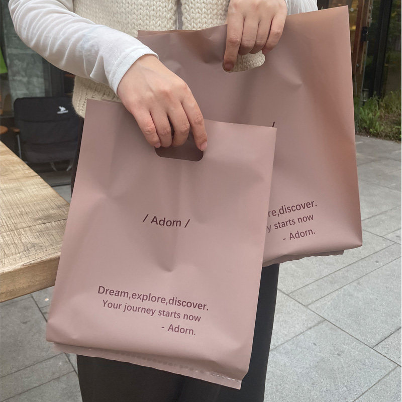 高级感磨砂女装服装店手提袋礼品购物塑料包装装衣服袋子定制logo