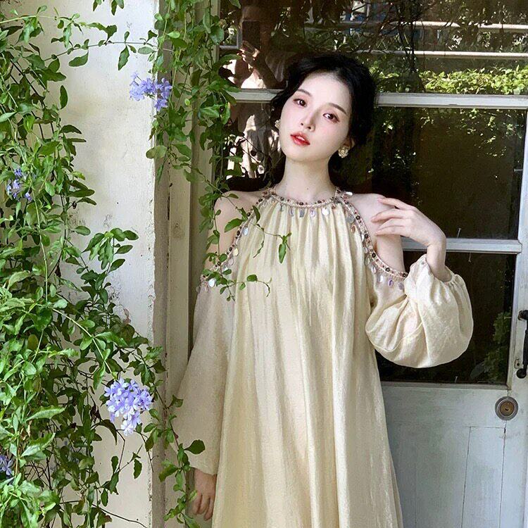 新疆旅游穿搭杏色裙夏季新款波西米亚连衣裙女云南草原青海配腰带