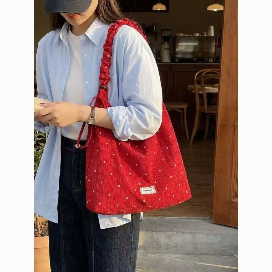 红色波点帆布包女款夏天休闲单肩斜挎包韩系慵懒风通勤百搭托特包