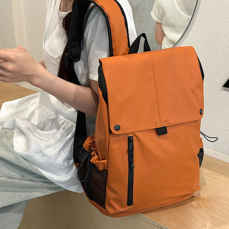 日本进口纯色电脑双肩包男大学生翻盖书包高中生校园背包女大学生