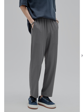 细华夫格肌理 KUYIOU/折角造型后袋中缝线松紧腰运动九分裤男 K62