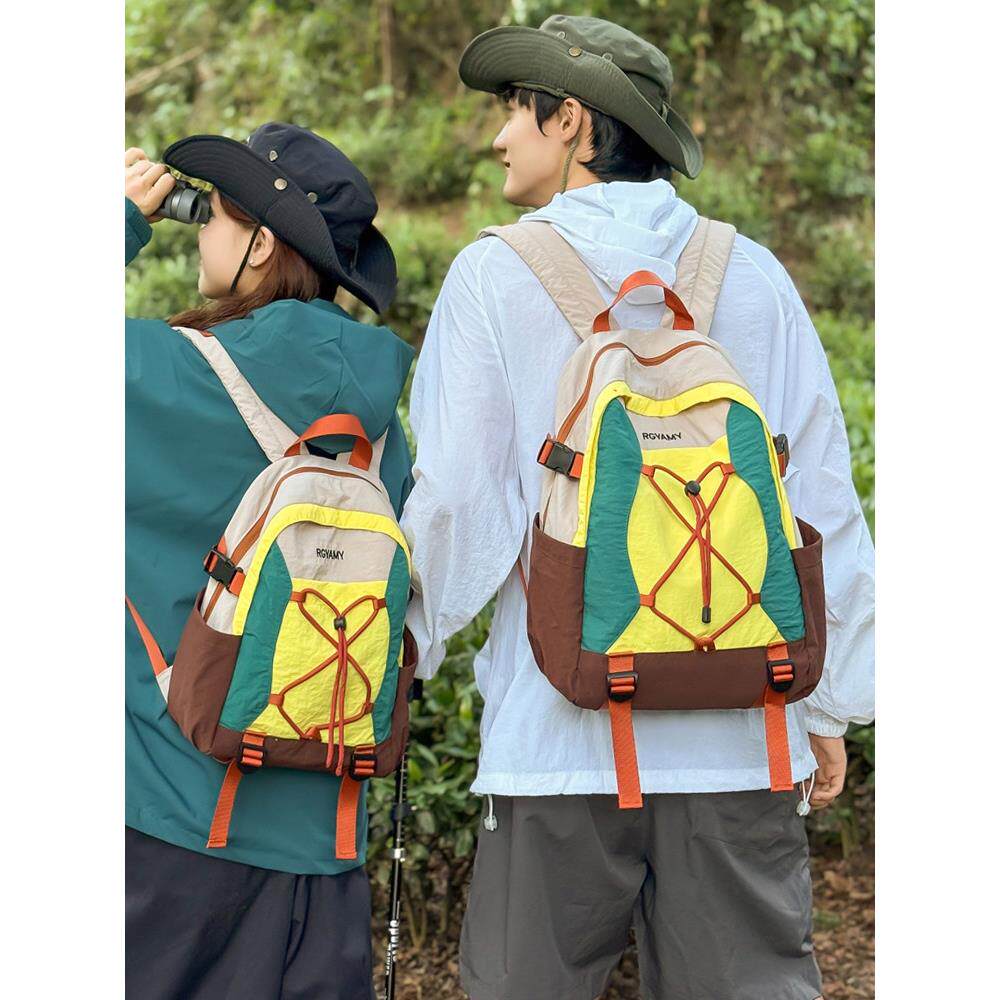 户外撞色轻便登山包徒步旅行包女轻量化防泼水双肩包男书包电脑包