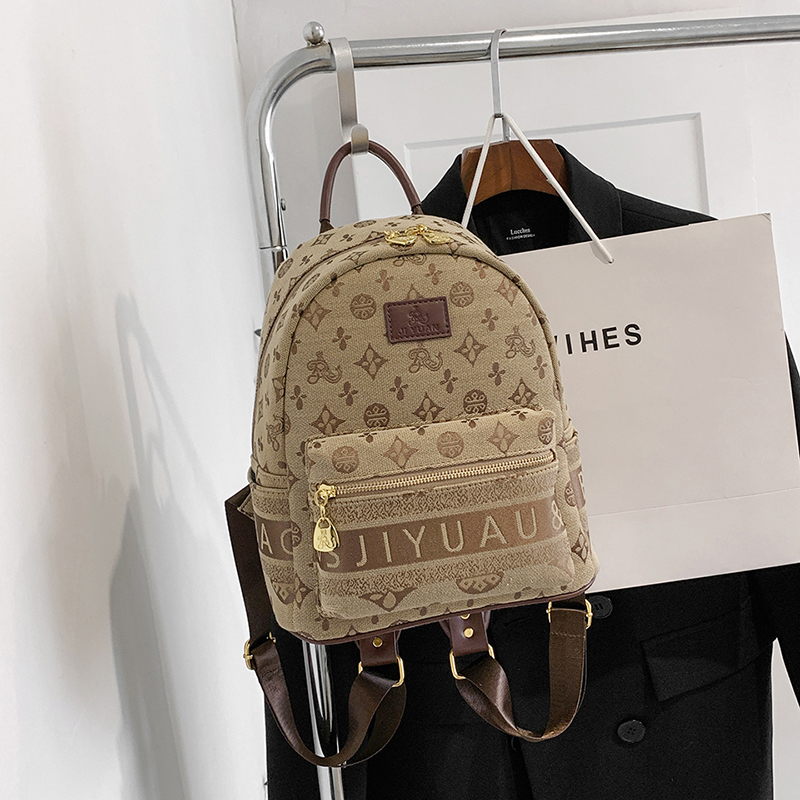 帆布学生书包休闲百搭旅行背包