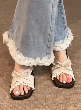 甜美花边蝴蝶结方头平底凉拖鞋女外穿2026夏季新款沙滩露趾一字拖