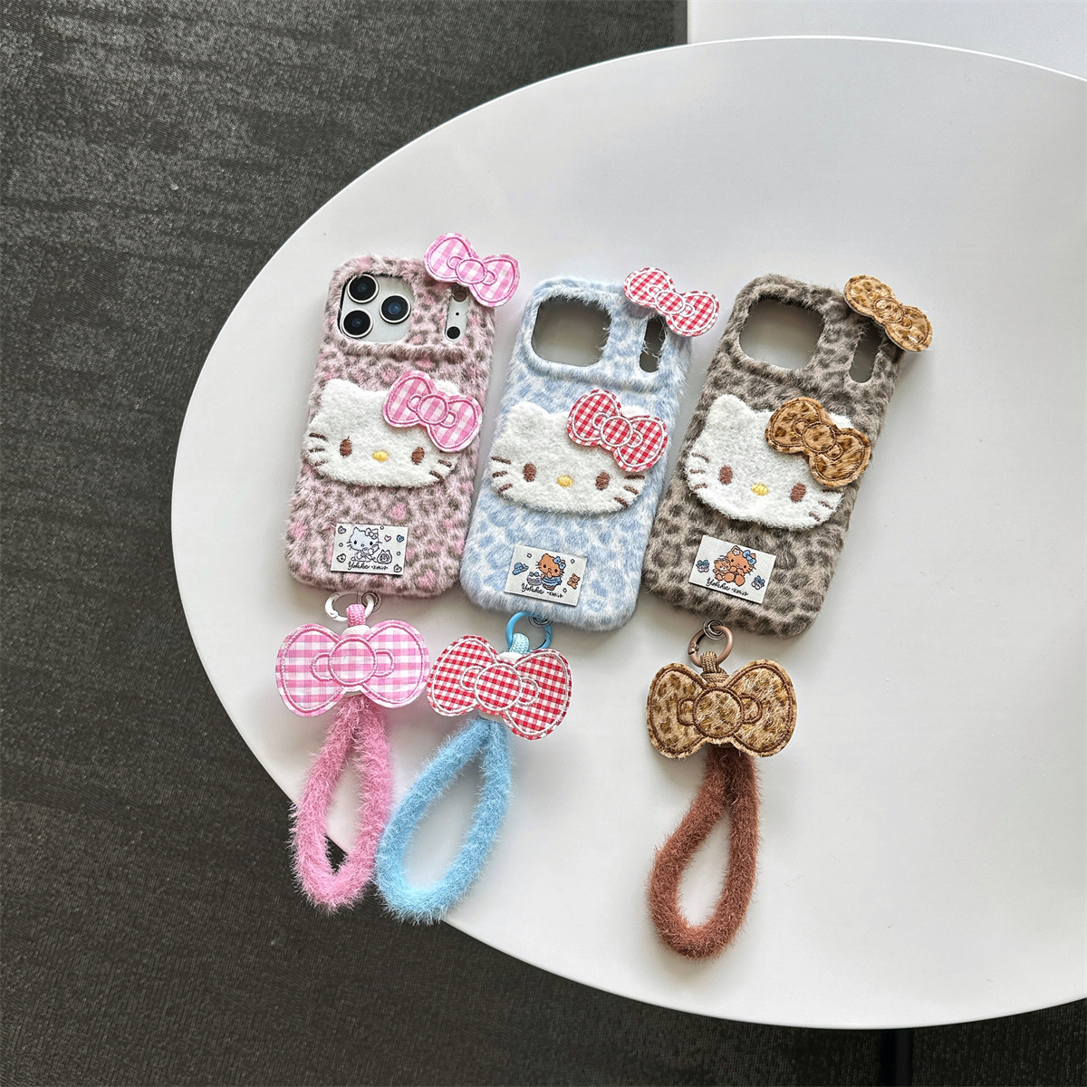 宏界 秋冬豹纹可爱立体蝴蝶结Kitty猫手绳适用苹果17ProMax手机壳iphone15新款16pro绒布壳14pro防摔13保护套