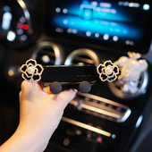 车载高档创意山茶花手机支架汽车出风口导航固定支撑架卡扣式 女神