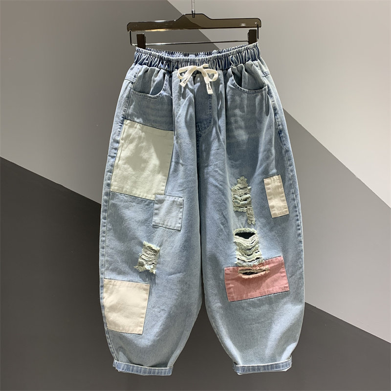 2026年春夏新款个性磨破贴标拼色休闲牛仔裤女百搭宽松九分哈伦裤