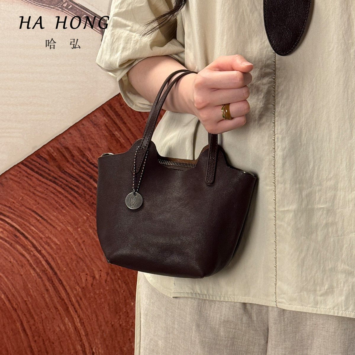 哈弘2025春夏新款植鞣头层牛皮菜篮包单肩斜挎手提小包百搭通勤风