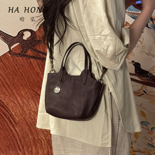 哈弘2025春夏新款植鞣头层牛皮菜篮包单肩斜挎手提小包百搭通勤风