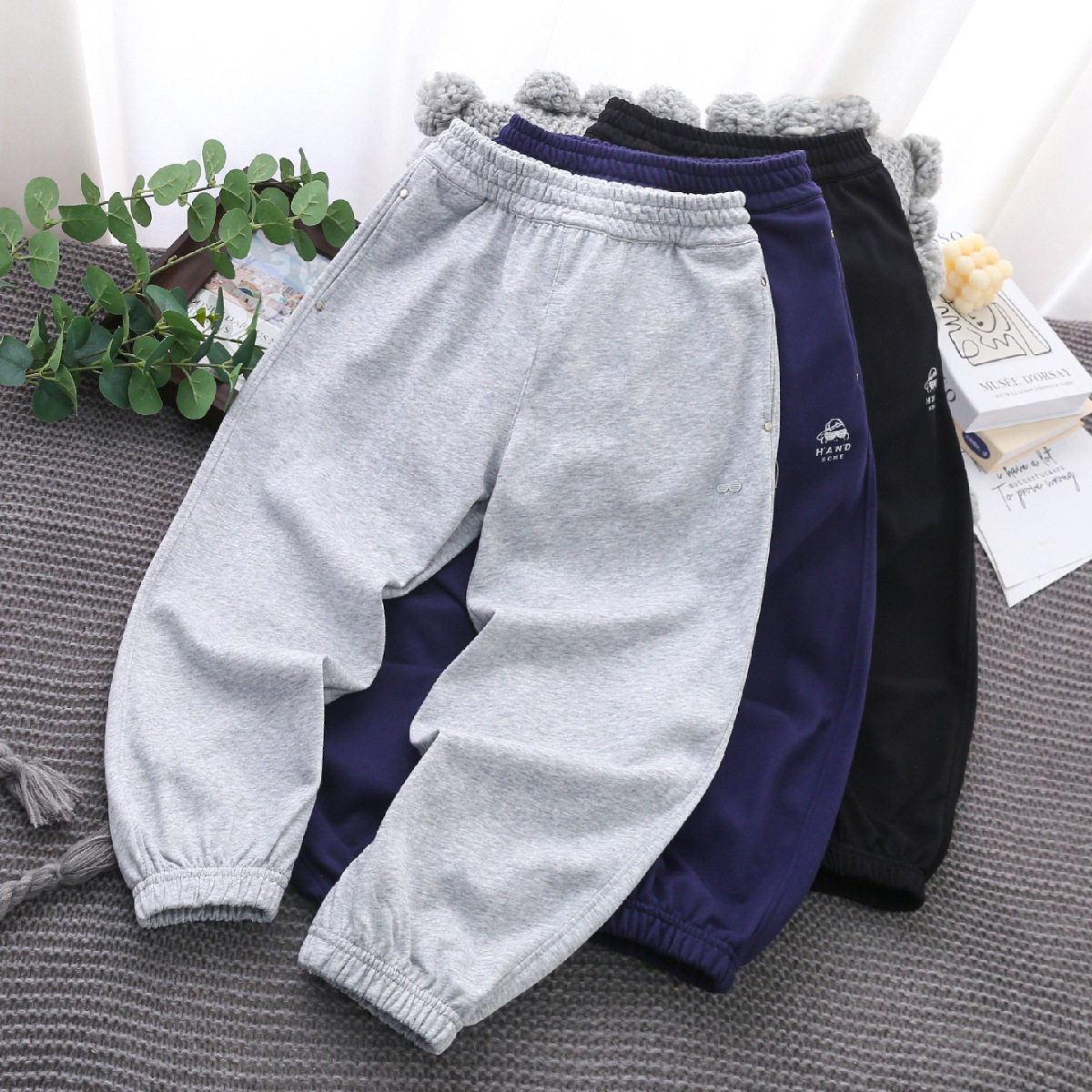 男童春秋新款休闲卫裤26年中大童小黄鸭童裤纯色针织运动裤子批发