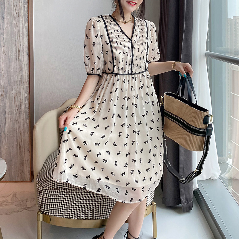 米白色蝴蝶结连衣裙女夏季网纱袖碎花裙子2022新款欧洲站欧货潮