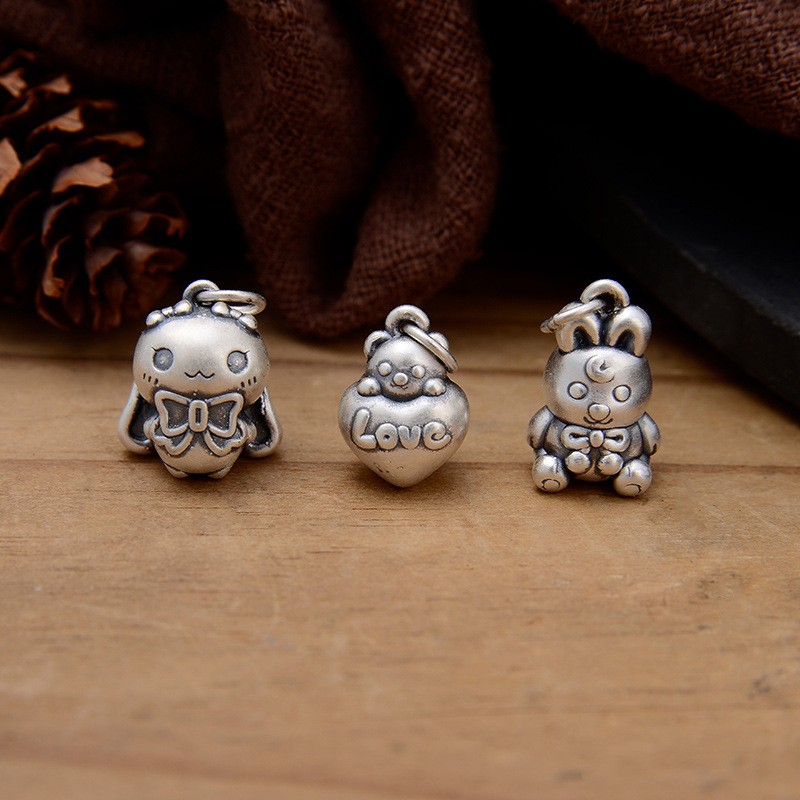 S999足银玉桂狗玩偶兔小趴熊挂件