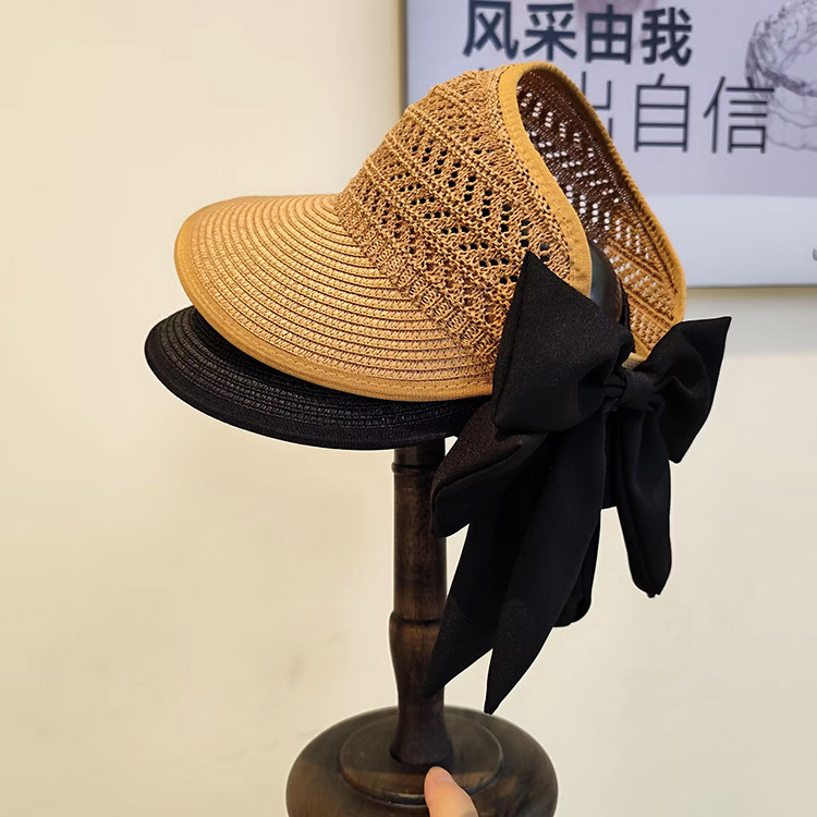 甜美沙滩度假镂空编织蝴蝶结草帽