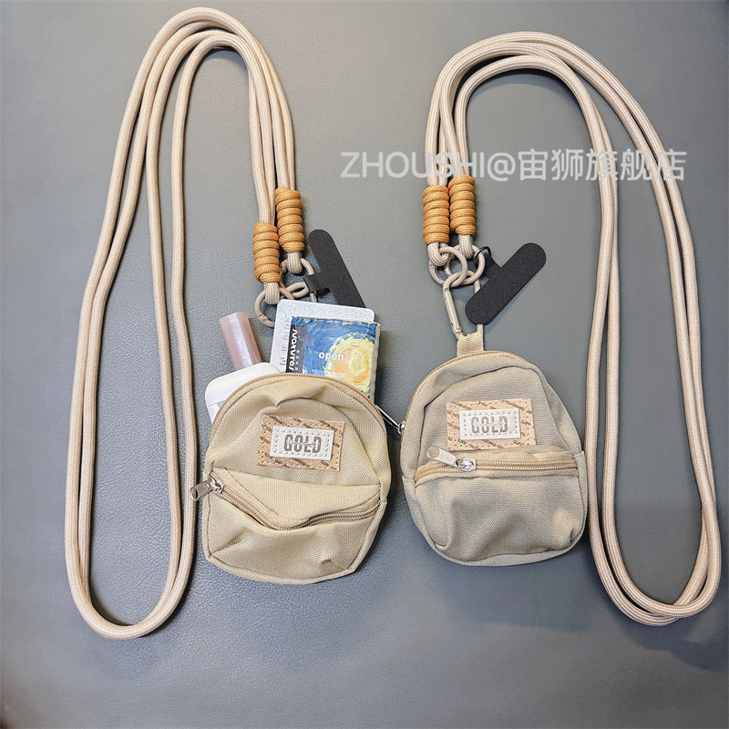 创意秋冬零钱包手机挂绳斜挎网红多功能手机壳挂绳可调节斜挎便携挂件收纳包挂链男女款户外旅游防丢侧背挂链图片