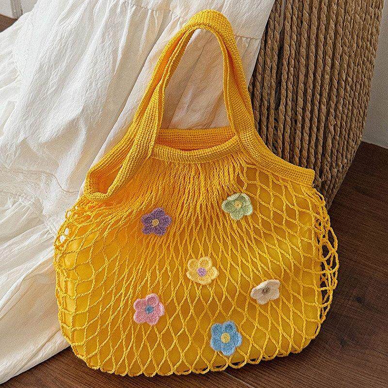 韩版小清新镂空包女2026春季新款时尚购物袋轻便休闲托特包沙滩包