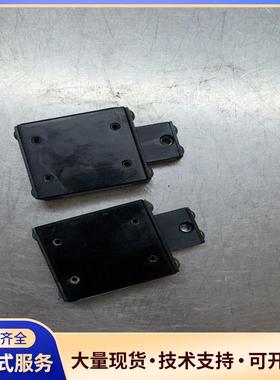 出两件DCI的黑色滑轨组件，每个都有四个安装孔。成色上有.