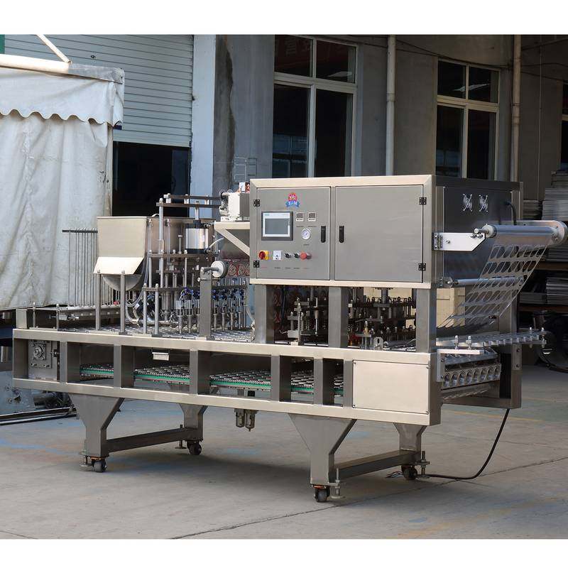 全自动锁鲜餐盒灌装封口机调料奶茶豆浆米酒保鲜一出八灌装封口机