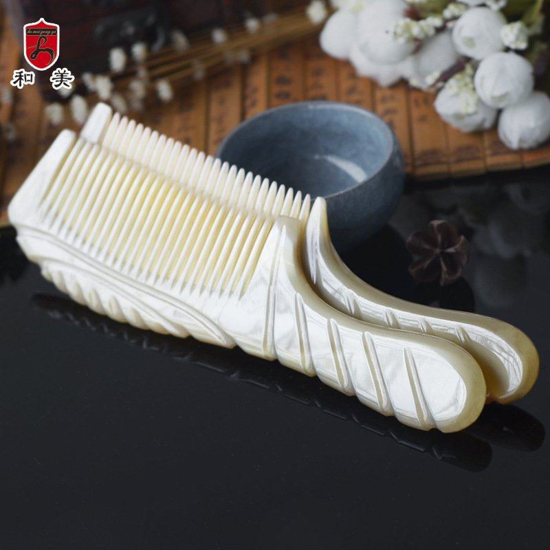 批发货源和美牛角梳大梳按摩号牦牛梳子雕花护发手柄角头皮牛角