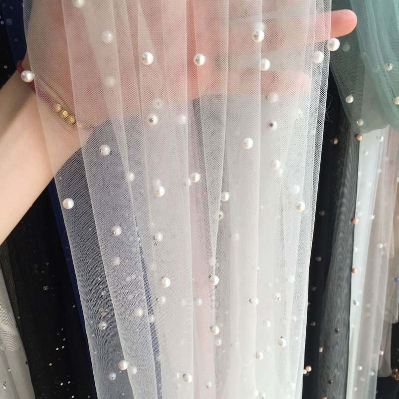 新款直销珍珠纱网眼布钉珠布料 珍珠网纱童装婚纱面料珠泡墙布桌