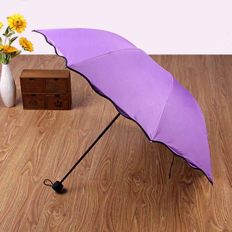 优选创意三折叠黑胶遇水开花伞礼品广告伞防晒晴雨伞可做LOGO雨伞