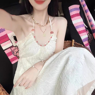 海边度假挂脖连衣裙女夏季2026法式露背沙滩裙子高腰无袖A字裙子
