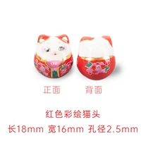 2 окрашенные в красный цвет кошачьи головы