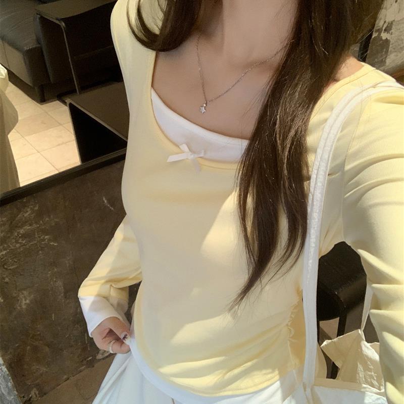 多巴胺鹅黄色拼接假两件蝴蝶结长袖T恤女秋季甜美修身设计感上衣