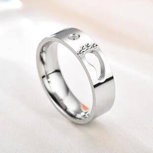 跨境欧美简约圣熙镂空不锈钢脚掌设计戒指饰品钢色镂空脚丫