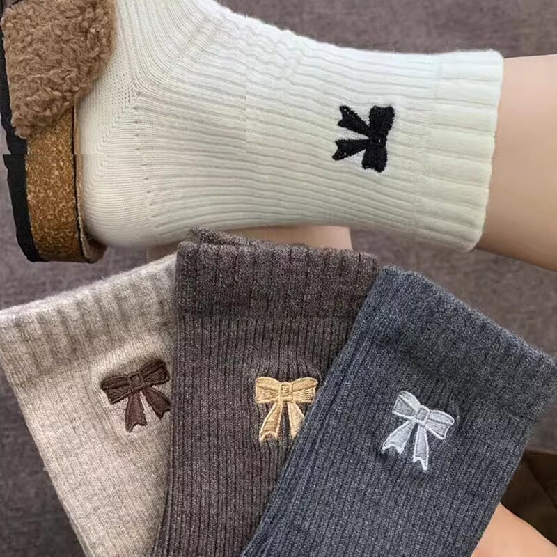 美拉德袜子女秋冬季中筒袜蝴蝶结长筒袜ins潮羊毛袜女堆堆袜长袜