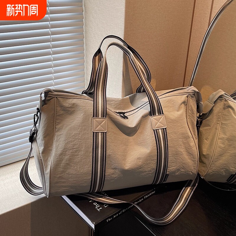 大容量旅行包尼龙防水行李袋手提登机袋长短途单肩健身游泳出差包