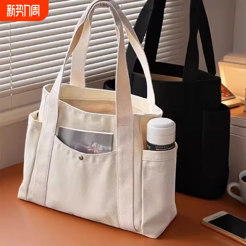 大容量托特帆布包女2026新款上班高颜值通勤百搭学生单肩手提包包