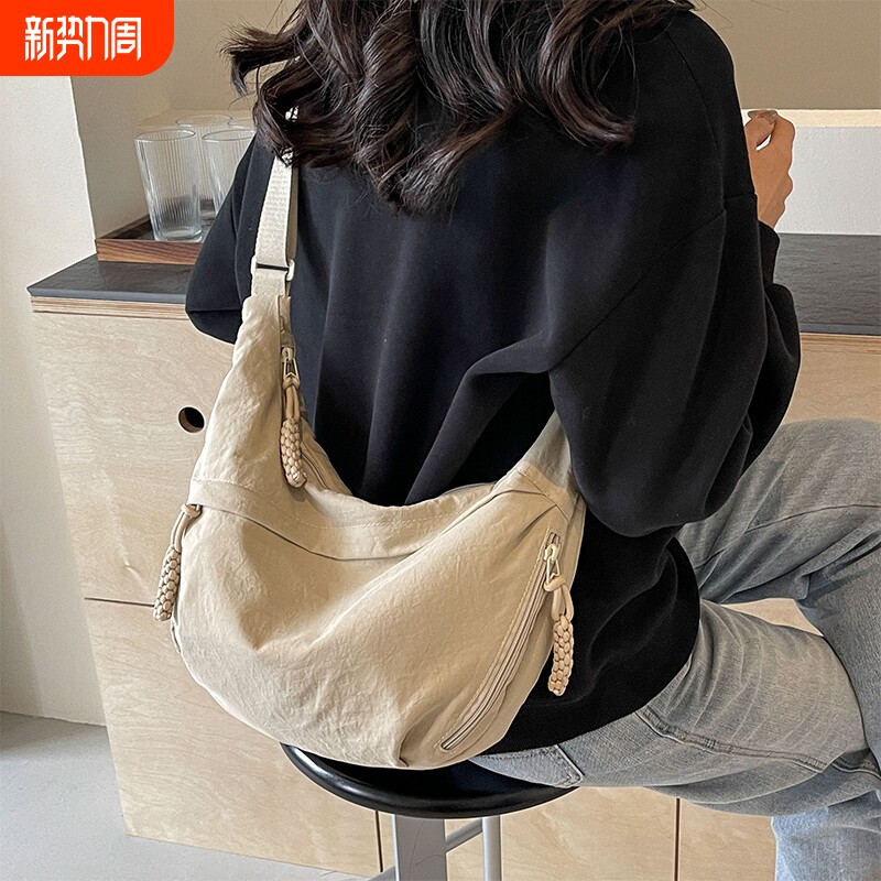 斜挎包饺子包包女式2025新款百搭休闲单肩背包大容量运动轻便小包